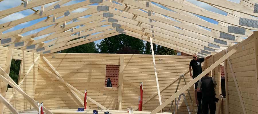 Blockhaus mit Scherenbinder